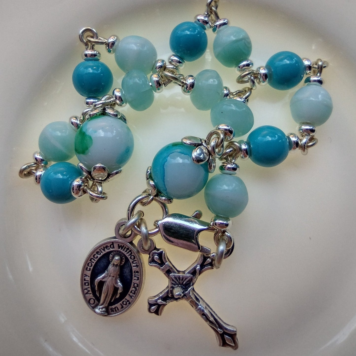 Item #1036, 6mm Rosary Bracelet, Aqua Glass