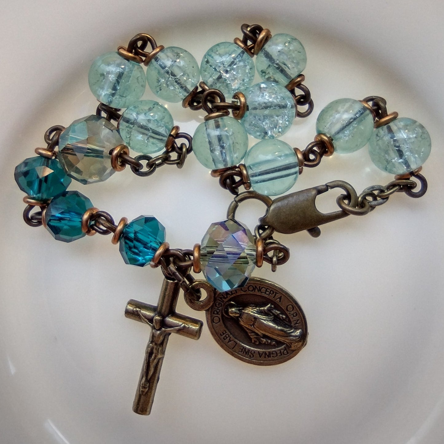 Item #1043, 6mm Rosary Bracelet, Aqua Crackle glass & Crystal